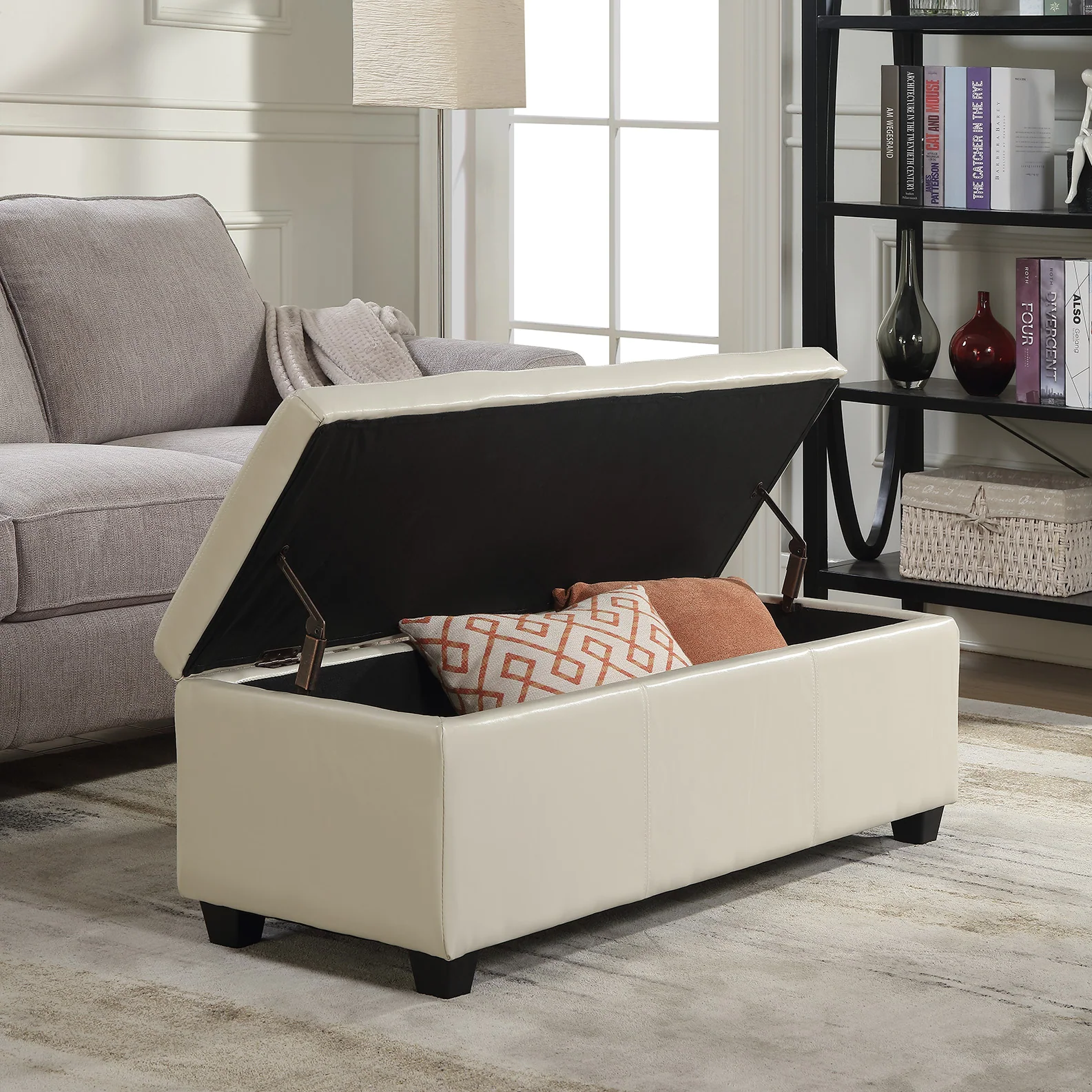 A storage ottoman solving storage needs in a living room.