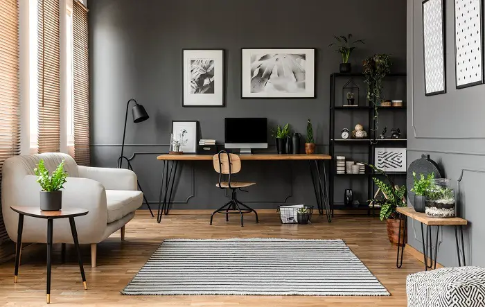 Managing a Home Office with black furniture.