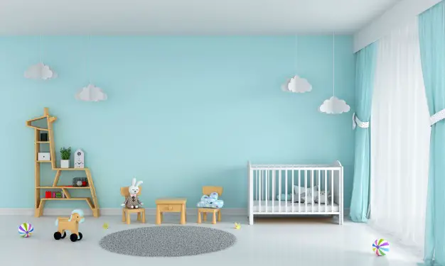 Decorate a Child's Room with blue walls and white furniture.