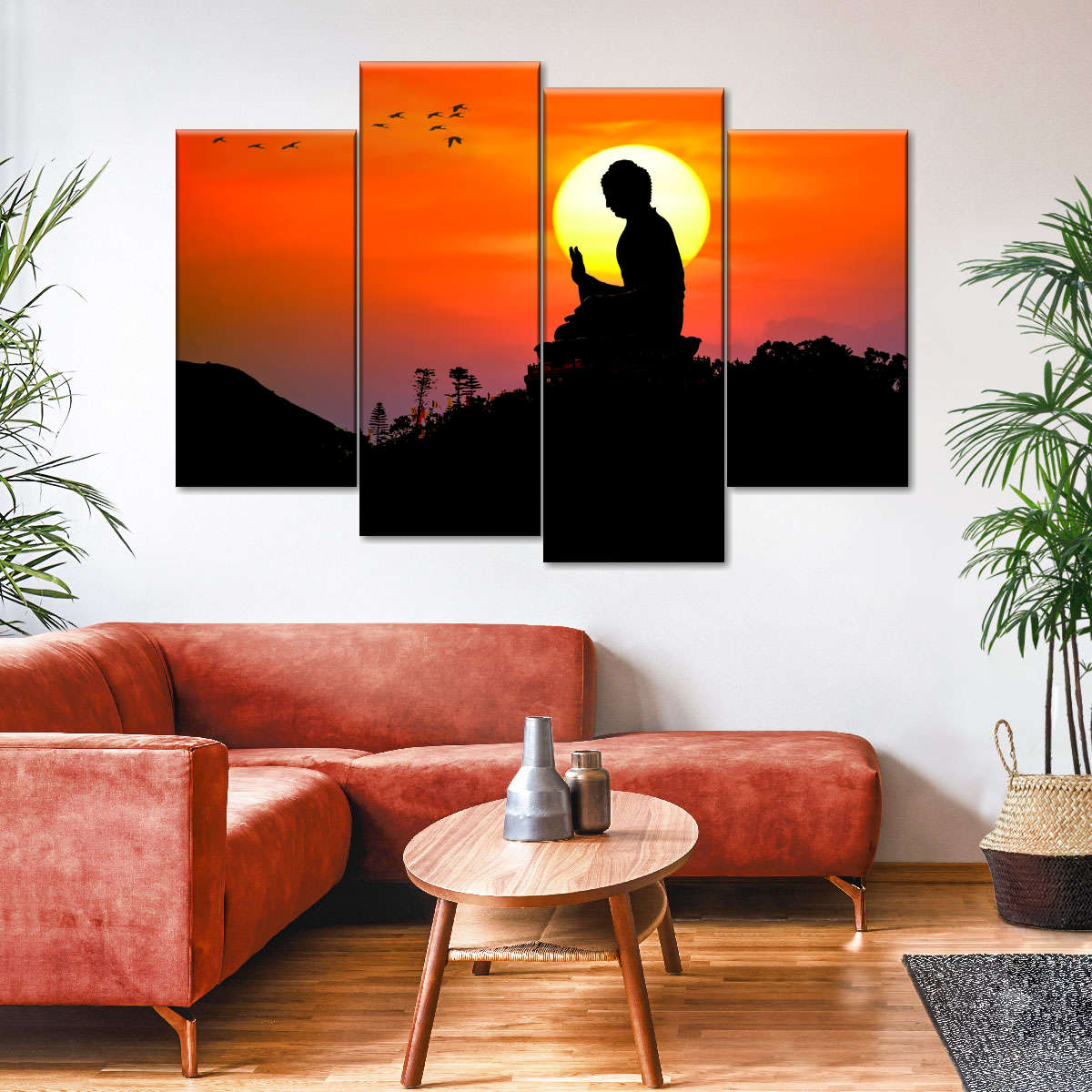 Buddha sitting on a hill at sunset canvas art for decorating the living room.