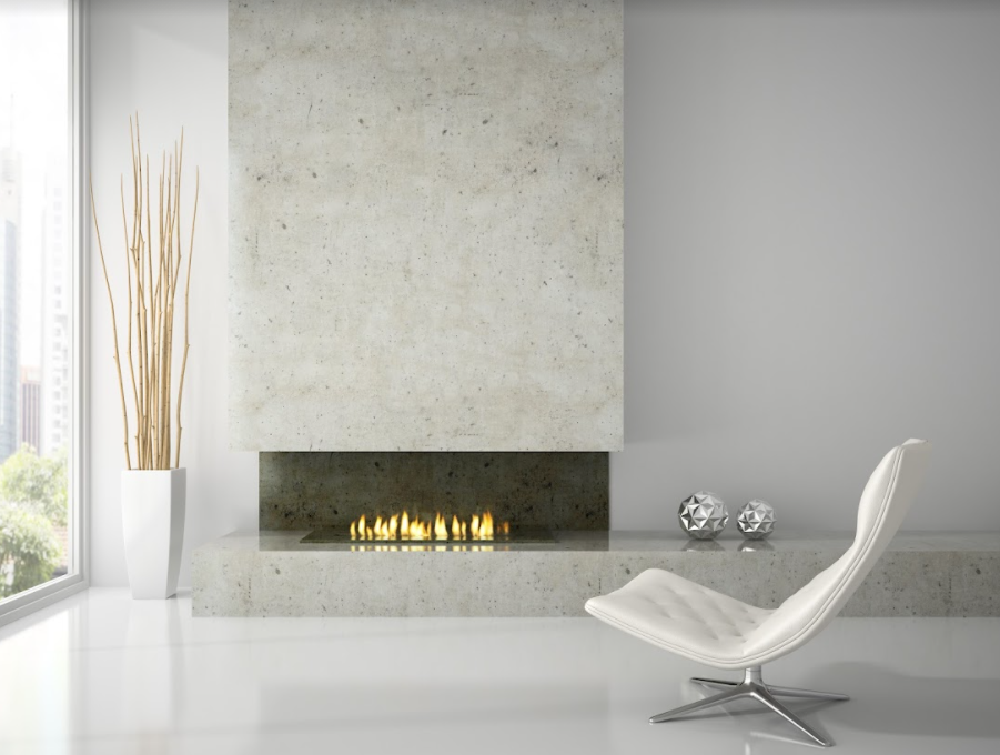 A contemporary living room with a stylish fireplace and a sleek white chair.
