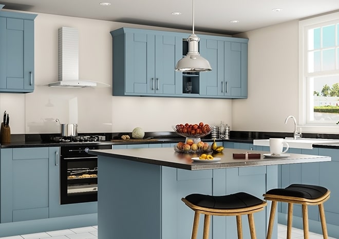 A modern kitchen with blue cabinets.