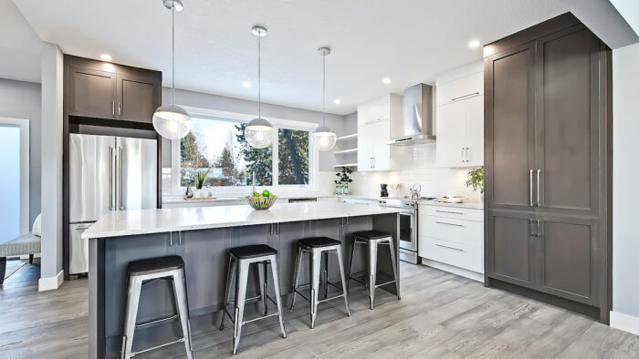 A modern kitchen with stainless steel appliances.