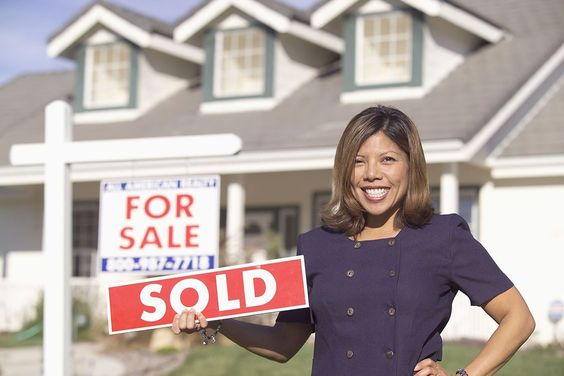 A woman selling a home.