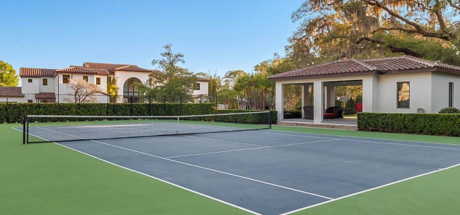 A home with a tennis court.