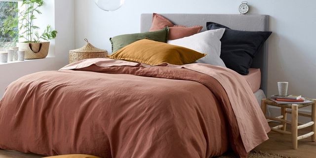 Bedroom with bed cover and pillows offers ideas for bedroom décor.