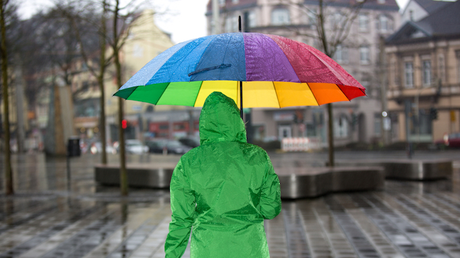 A person holding an umbrella.