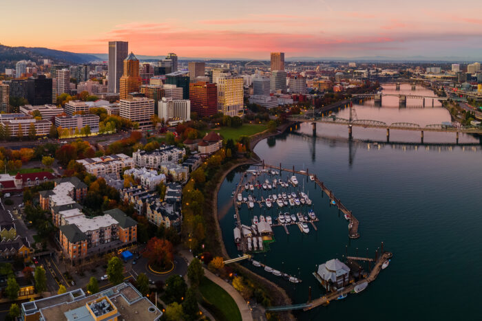 Best Weekend Getaways: An aerial view of the Portland skyline at sunset.