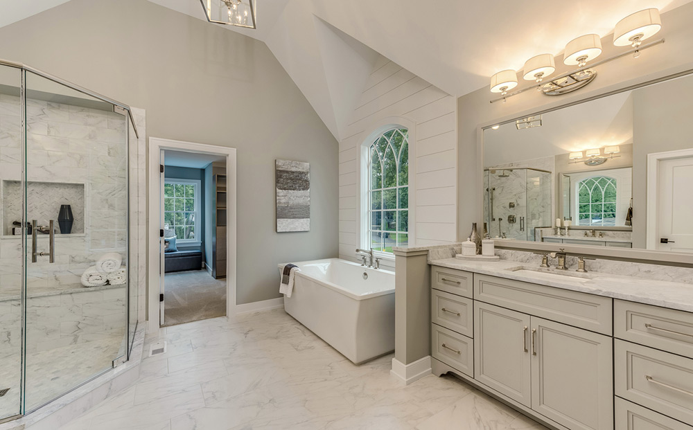 A spacious bathroom with a walk-in shower and double sinks, perfect for bathroom remodeling.