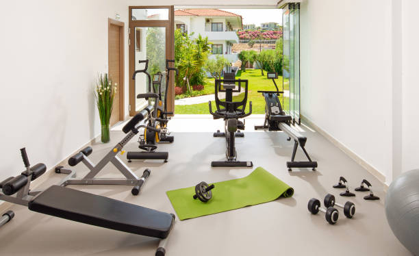 3 Tips for Building Your Home Gym with a variety of exercise equipment.
