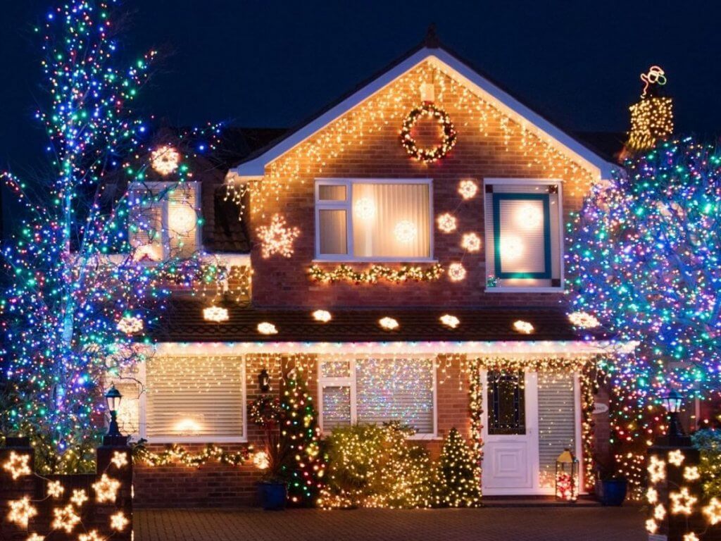 A house is adorned with Christmas lighting.