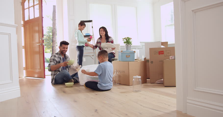 A family is moving into their new home - moving stock videos & royalty-free footage.