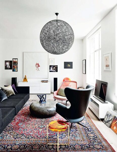 A timeless living room with a large rug.