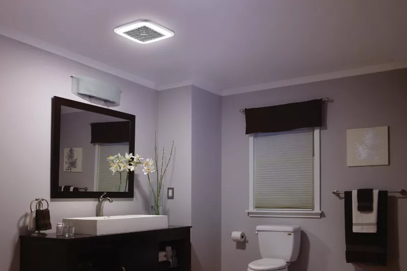 A bathroom equipped with a ceiling fan for improved ventilation.