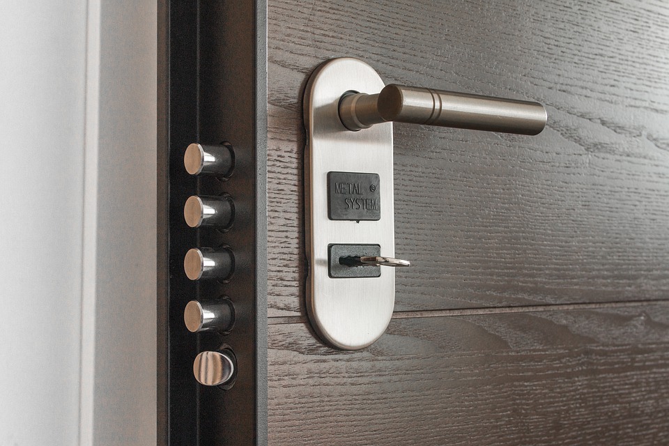A close up of a door with a lock on it showcasing popular locks for homes.