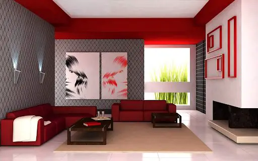 A modern living room with red and white accents.