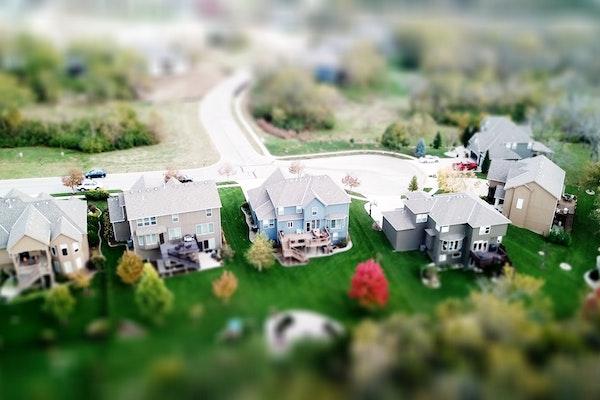 Aerial view of houses in a Real Estate neighborhood.