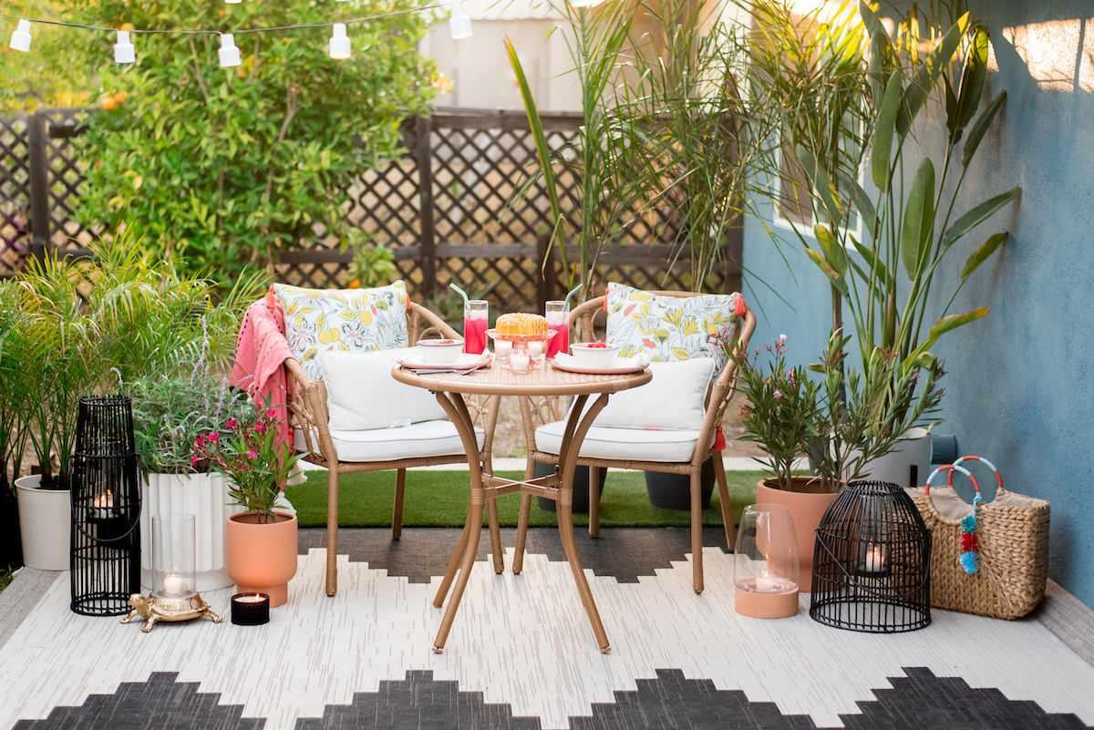 Outdoor patio with table and chairs.