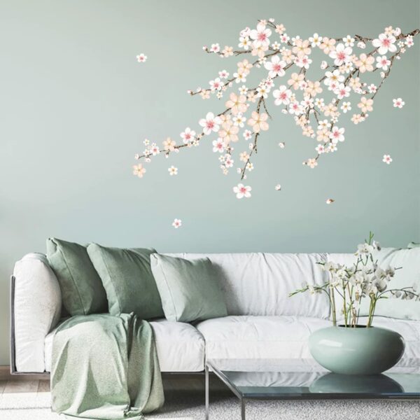 A living room with sakura blossom wall decals that upgrades home ambiance.