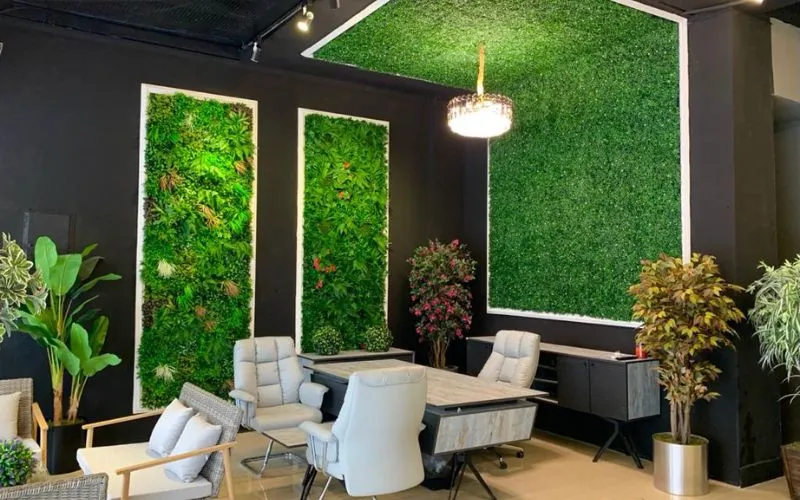 An office with artificial grass decor.