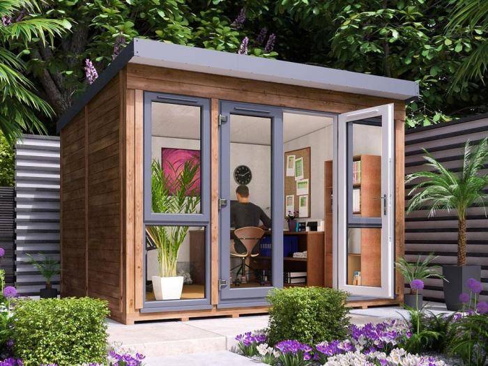 A garden office with plants.