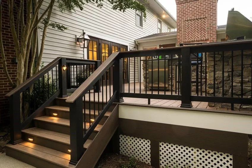 A wooden deck with a railing.