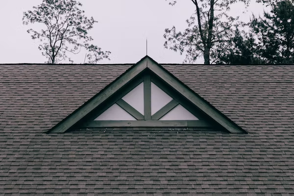 An image of a metal roof with a triangle on it.
