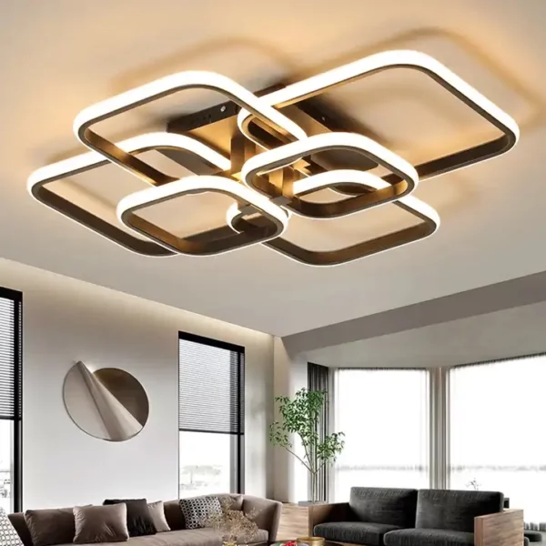 A modern living room with a modern ceiling hugger fan.