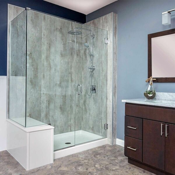 A bathroom with a glass shower stall and low maintenance shower walls.