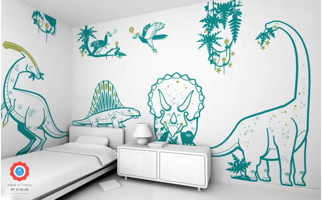 A bedroom with dinosaur wall decals.