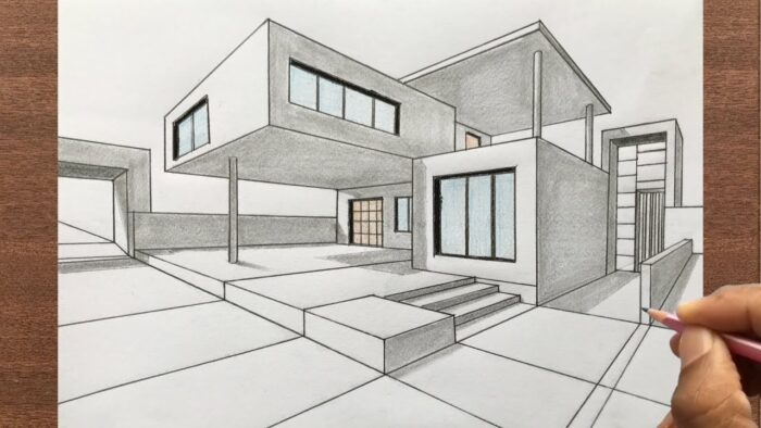 A person is drawing a modern house.