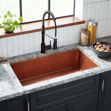 A modern copper kitchen sink.