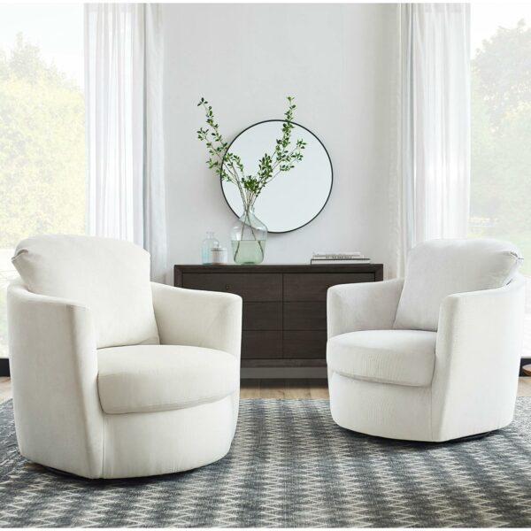 Two accent chairs in a living room.