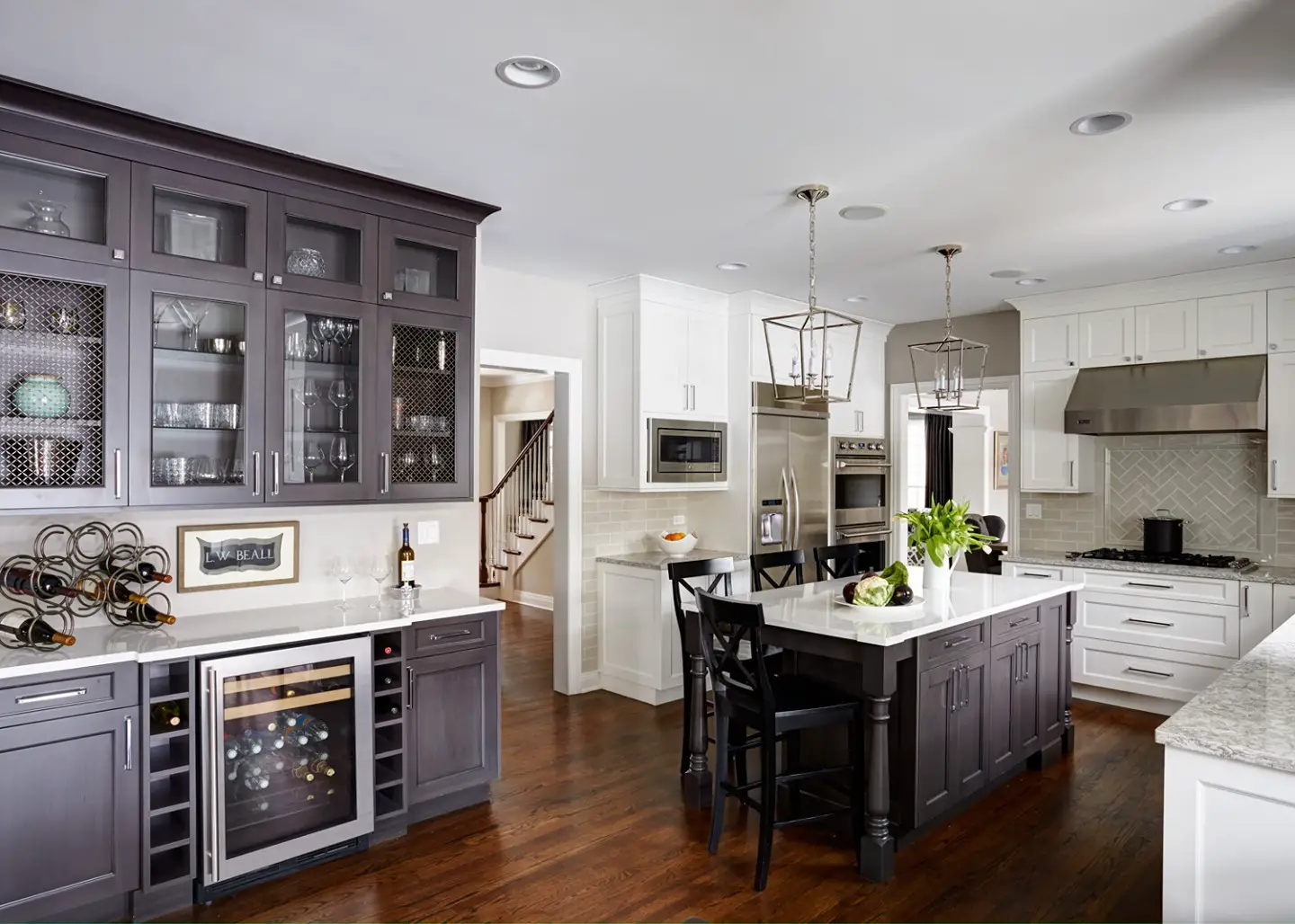 A kitchen with white cabinets and an auto draft.