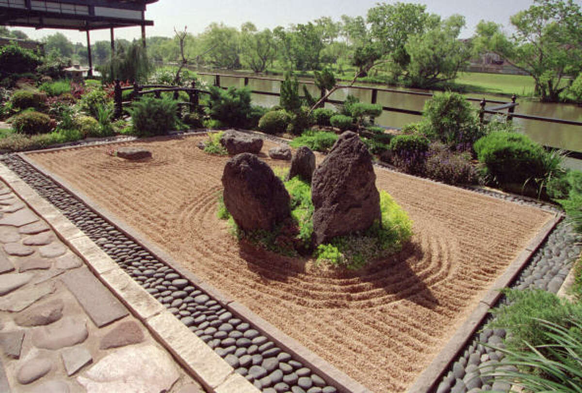 A tranquil Japanese garden with rocks and stones.