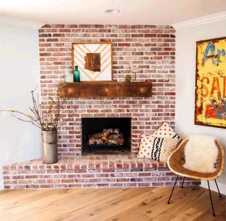 Choose an exposed red brick fireplace 