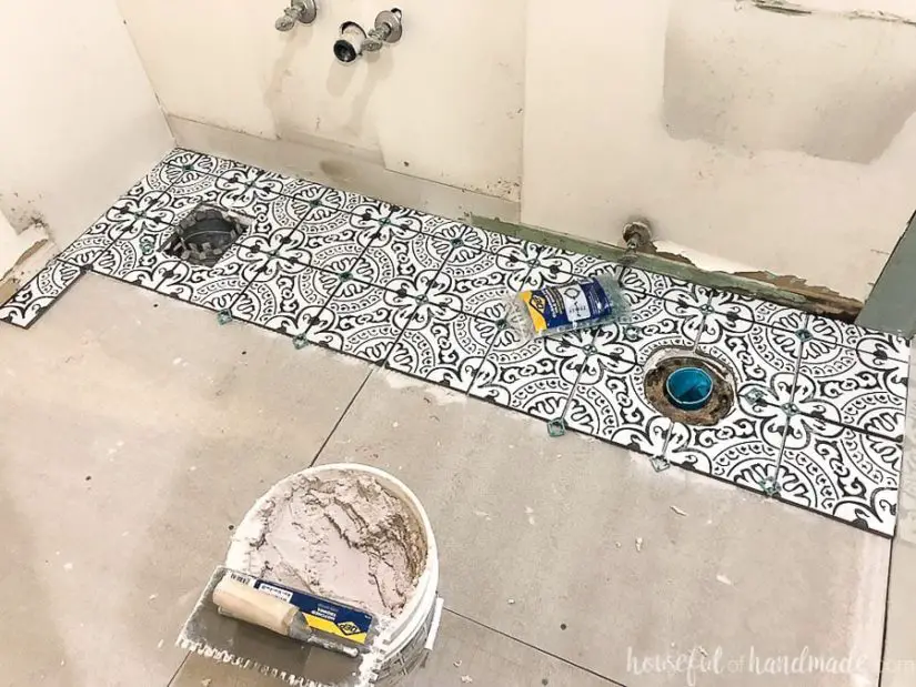 Install tile flooring 