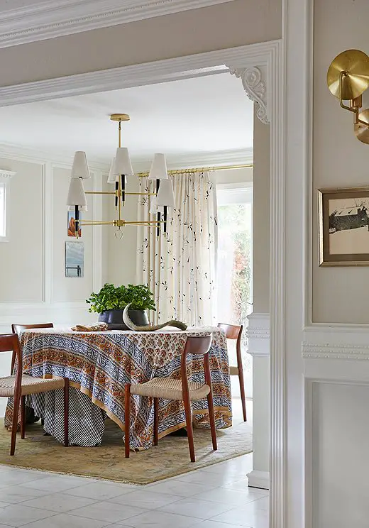 Use a statement table cloth and unique furniture