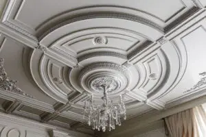 Carved POP living room ceiling design. (Photo by magicbricks.com)