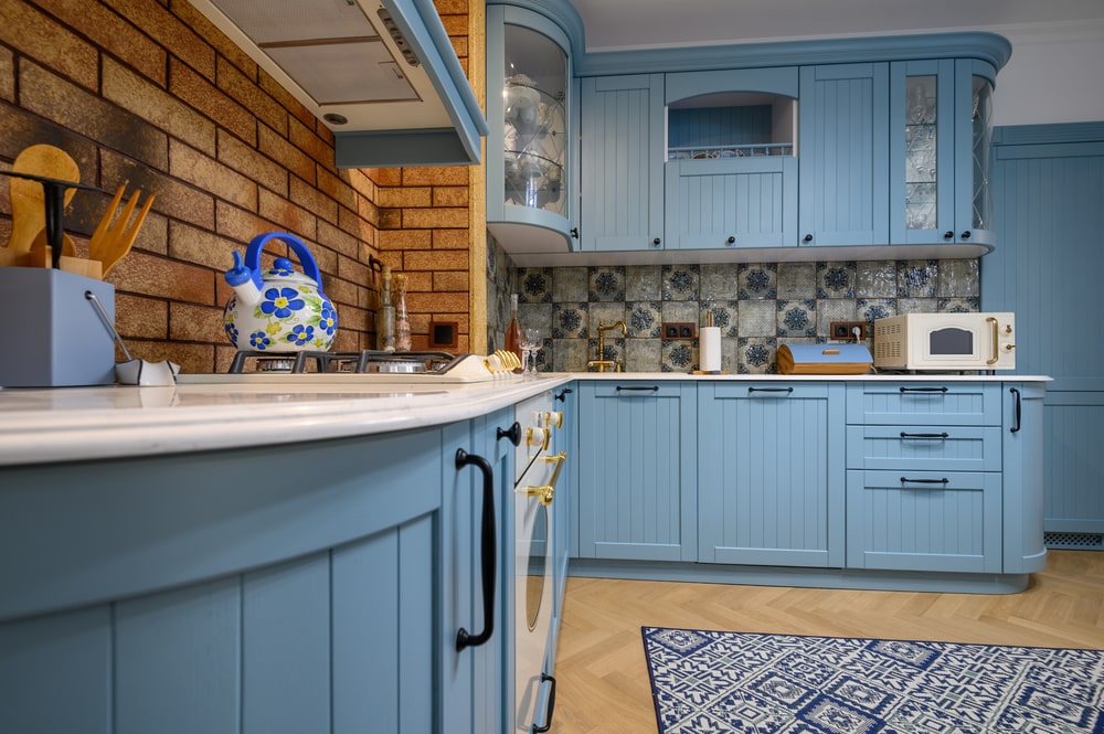 Blue kitchen interior with vintage details.