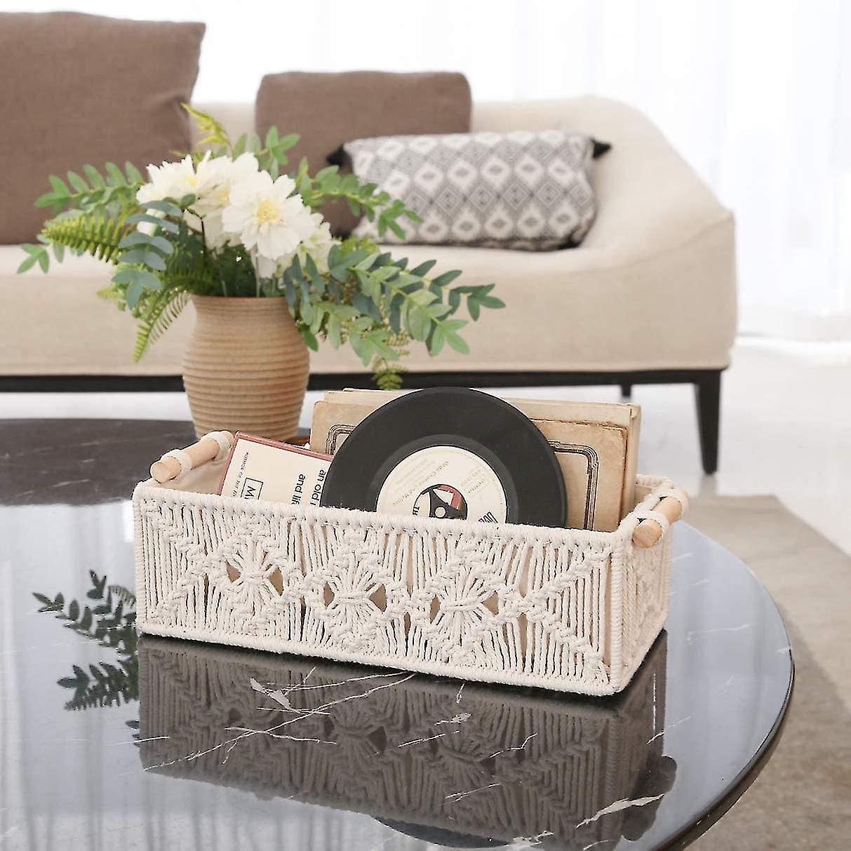 Boho basket with vinyl records on coffee table.