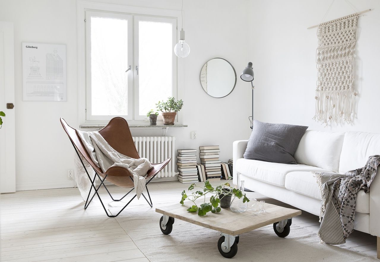 Bright minimalist living room interior design.