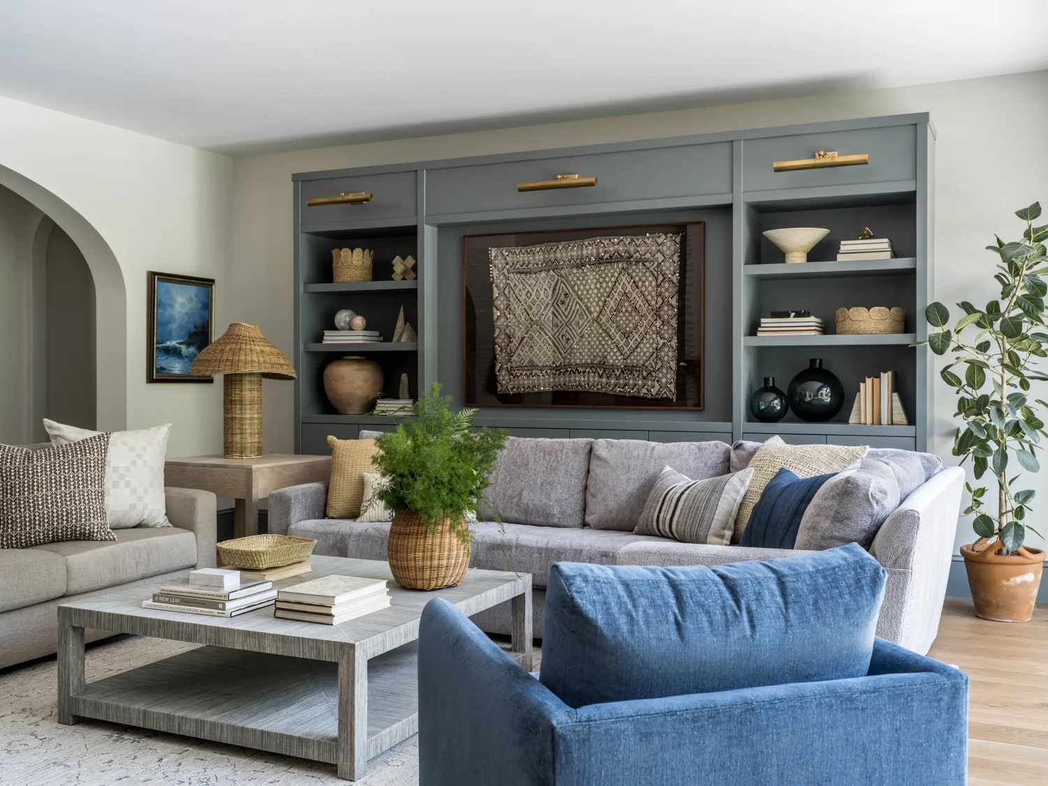 Elegant living room with blue and gray decor.