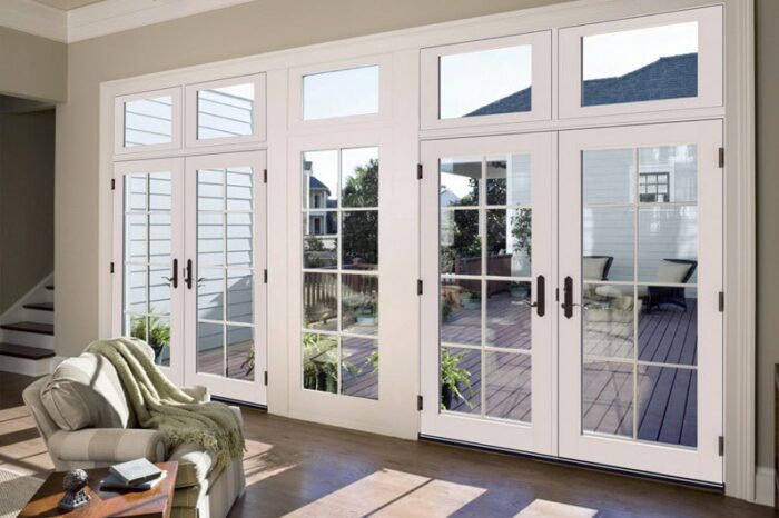 Modern room with French patio doors leading to deck.