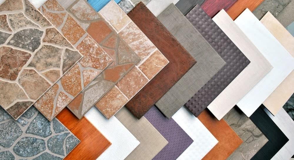 Select tile type and size, such as porcelain for durability, glass for shine, or large format to minimize grout