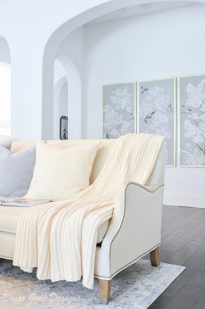 Drape fold and arrange ‌throws with intent to create effortless​ designer polish